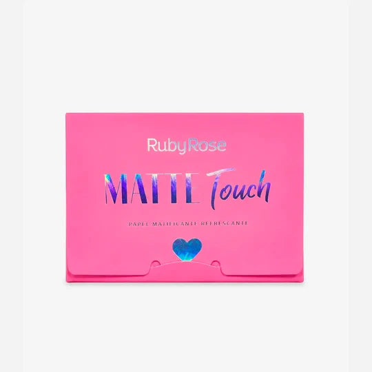 Papel matificante Matte Touch Ruby Rose en estuche rosado para eliminar el exceso de oleosidad del rostro.
