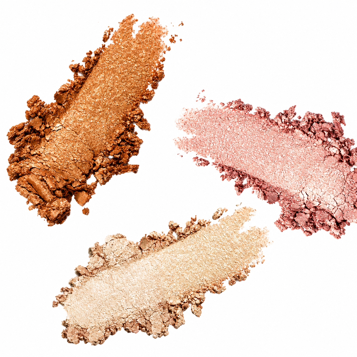 Muestras de tonos del iluminador Ruby Rose Crystal Glow: dorado, rosado y champagne.