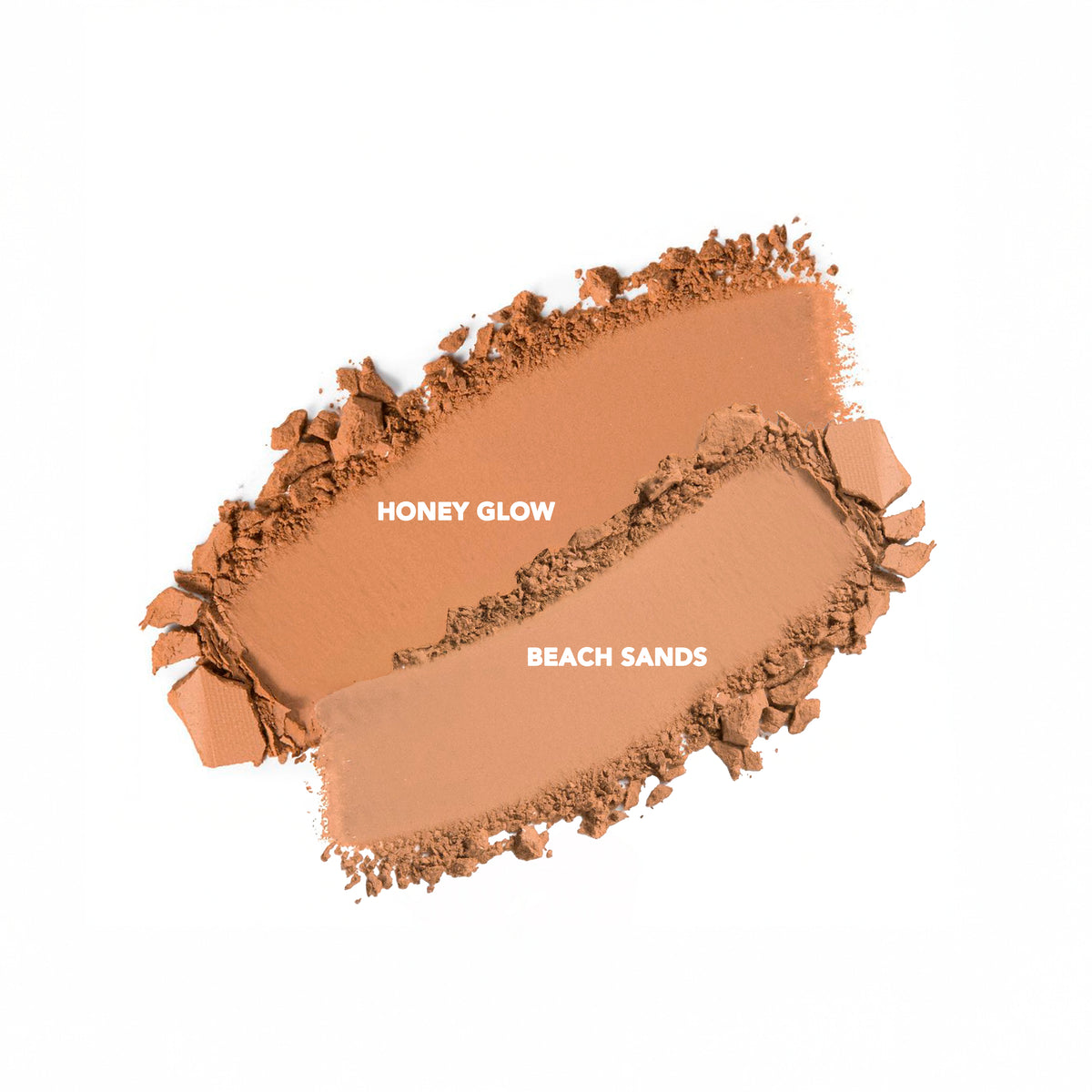Muestras de tonos del Polvo Bronceador Amber Bronze Ruby Rose: Honey Glow y Beach Sands.