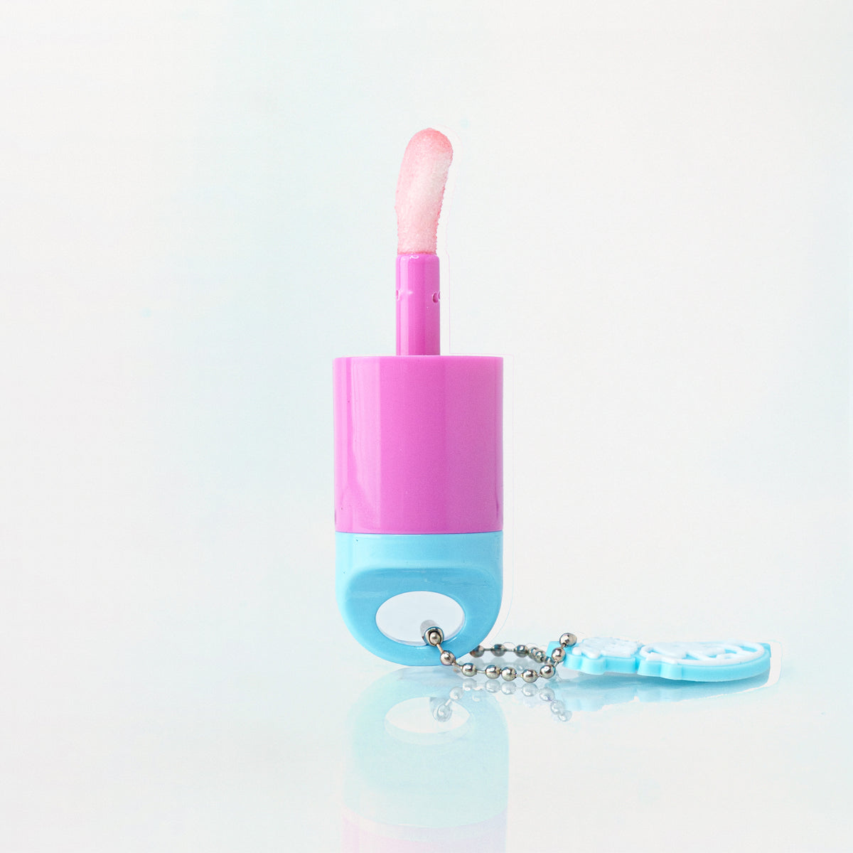 Lip Oil Pop Star Ruby Rose tono Liquor con aplicador.